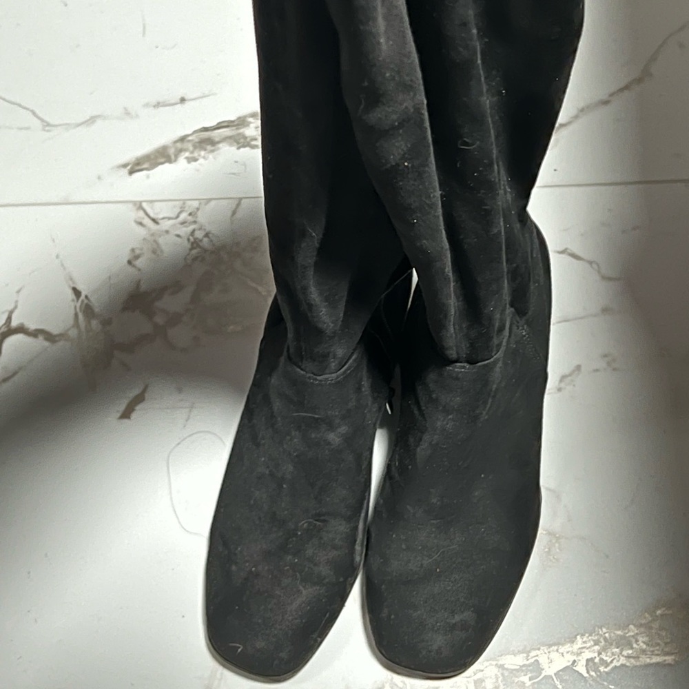 Over the knee black boots